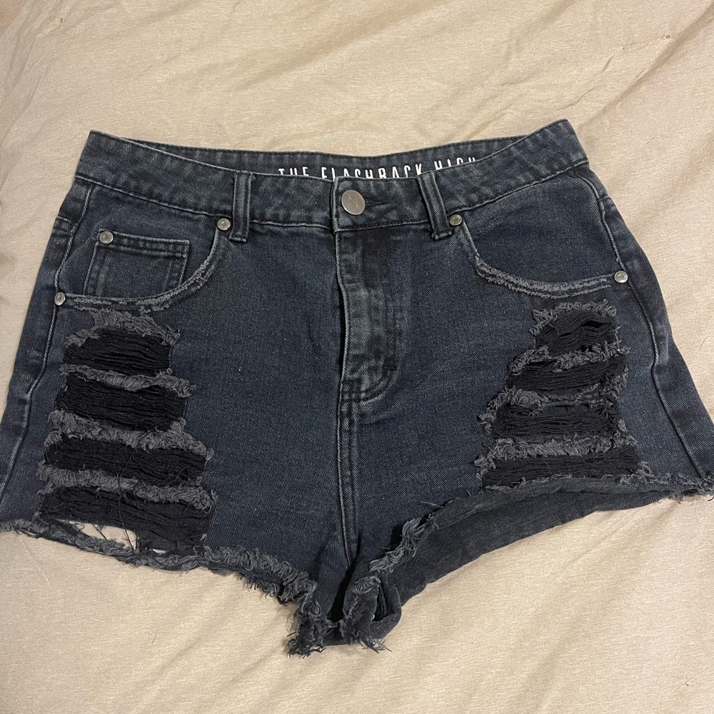 Distressed black jean shorts